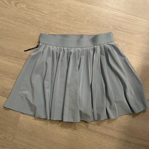 Aritzia Dresses & Skirts - TnaMOVE Tennis Micro Skirt